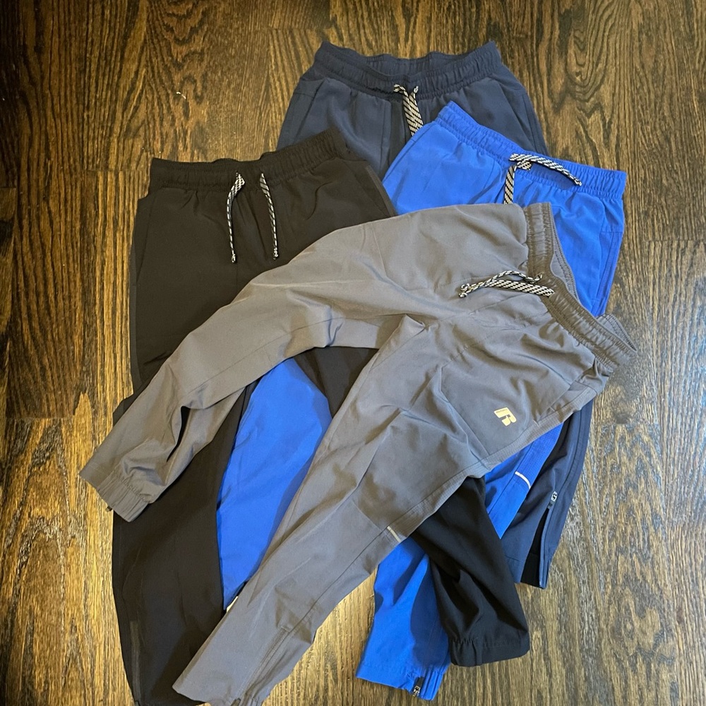 Russel active pants size 6/7.   Four pairs